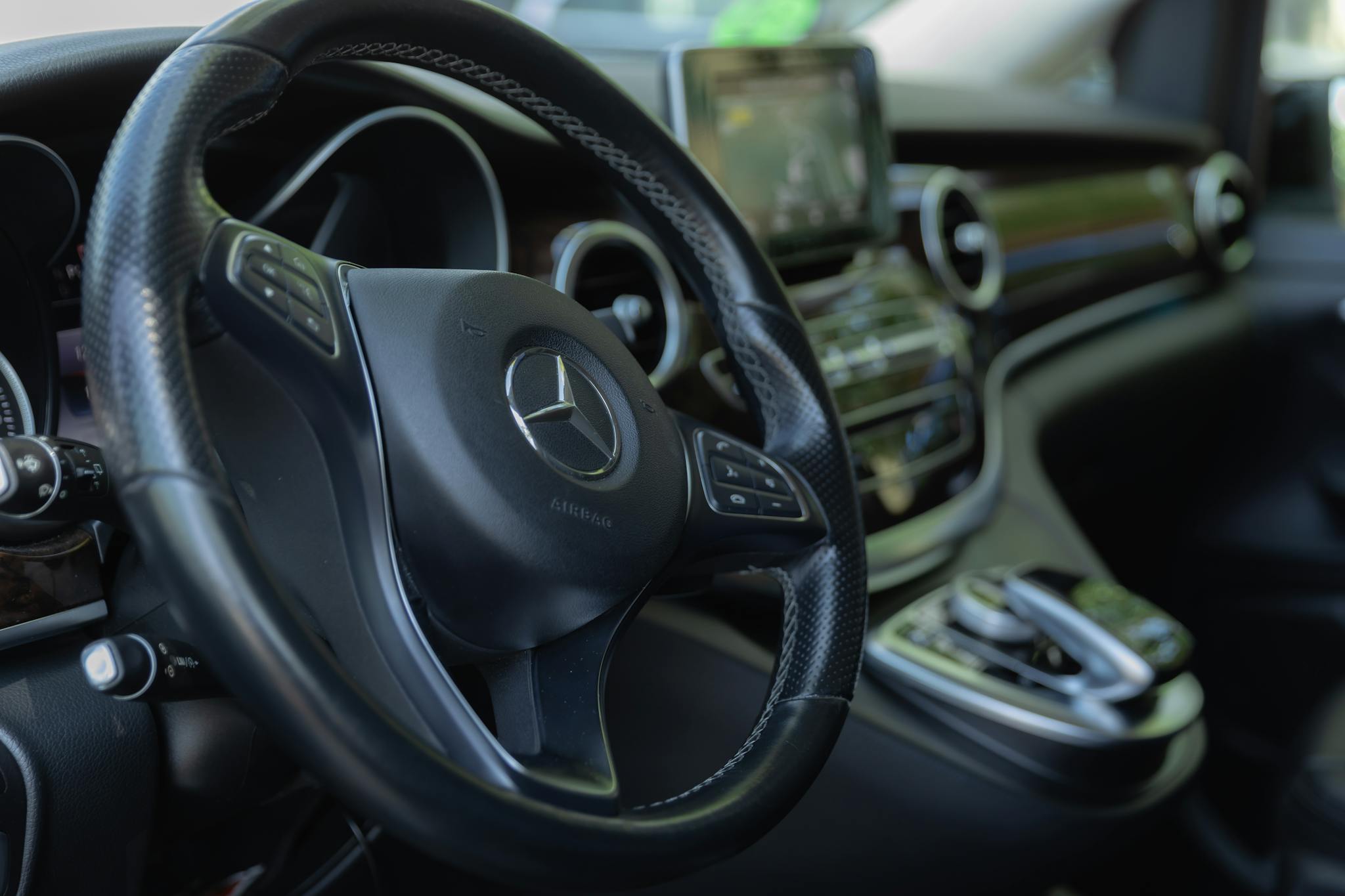 Explore the elegant interior of a Mercedes-Benz showcasing a sleek design and modern features.